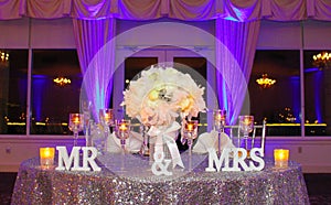 The Bride and Grooms Table at their Reception photo