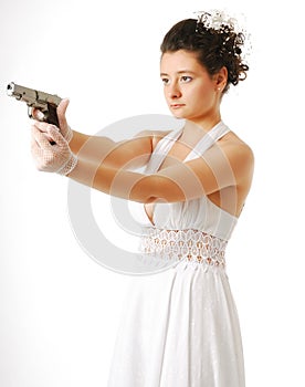 Bride with gun isolated on white
