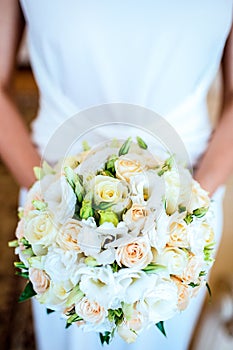 Bride holding bouguet of flowers