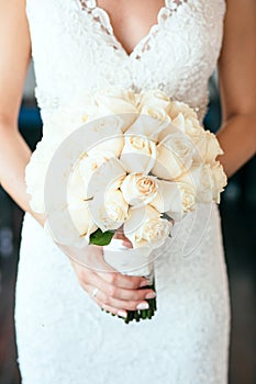 Bride holding bouguet of flowers