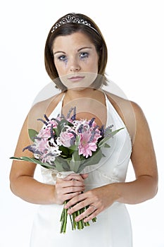 Bride Holding Bouquet And Crying