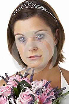 Bride Holding Bouquet And Crying