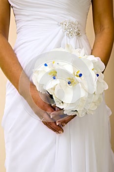 Bride is holding bouquet of flowers