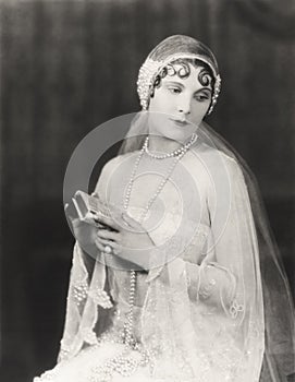 Bride holding clutch purse