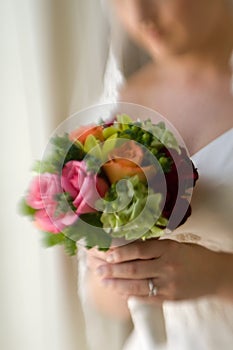 Bride holding her bridal bouquet