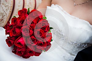 Bride Holding Red Rose Bouquet