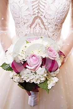 Bride holding a wedding bouquet