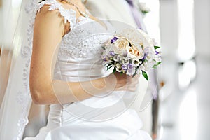 Bride holding wedding bouquet