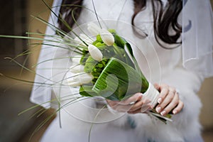 Bride holding wedding bouquet