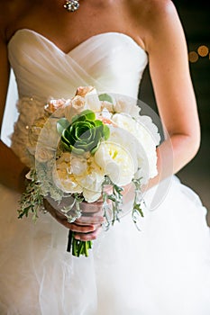 Bride holding wedding bouquet