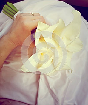 Bride holding wedding bouquet