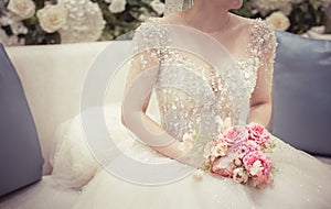 Bride holding the wedding bouquet, Detail image cut