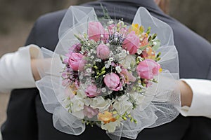 A bride holding wedding bouquet