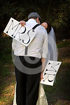 Bride kissing groom