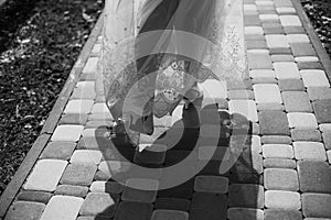 bride legs dress footpath motion with shadow