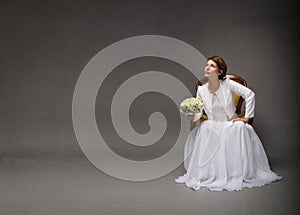 Bride looking up with empty space