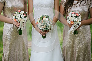 Bride and maids with flowers photo