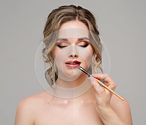 Bride Make up Before and After. Woman with Red Lipstick. Beauty Model Face Make up Transformation over Gray Studio Background