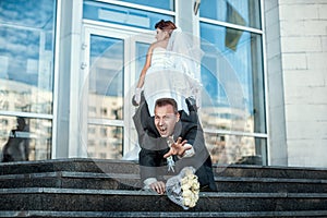 Bride makes groom to marry.