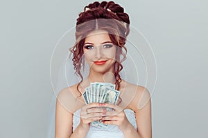 Bride with Money. Closeup portrait beautiful young pretty woman in wedding clothing girl looking at you camera holding money usd