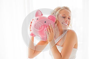 Bride with piggy bank being silly