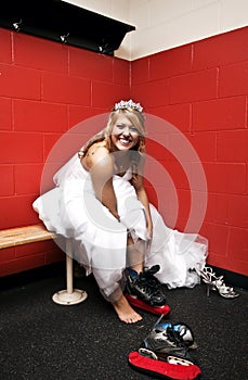 Bride putting on ice skates