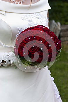 Bride with red roses