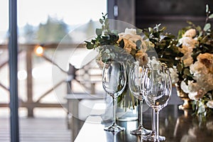 The bride`s bouquet lies on a buffet table