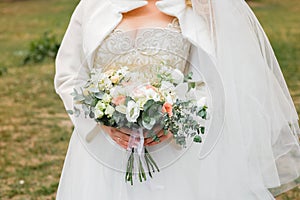 Bride`s bouquet on the nature. Wedding day