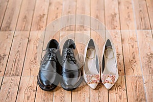 Bride`s and groom`s shoes. Bride And Groom`s Shoes Side By Side.