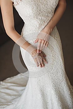 The bride`s hands. Beautiful ring and bracelet.