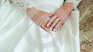 The bride`s hands with manicure