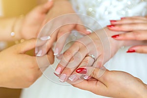 Bride`s manicure.Hands of bride place for text