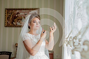 Bride`s morning.The fees of the bride.Wedding photo