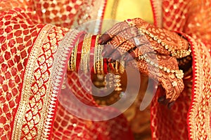 Bride showing mehndi in hands