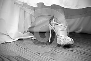 Bride showing off her beautiful shoes