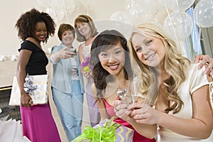 Bride Sitting With Her Friend Showing Big Engagement Ring