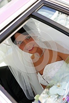 Bride smiling through window