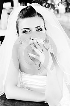 Bride smoking a cigarette