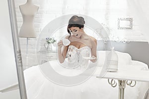 Bride spilling coffee on wedding dress