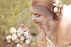 Bride with stylish make-up in white dress