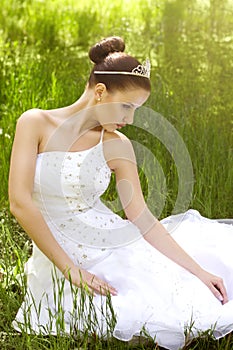 Bride with stylish make-up in white dress