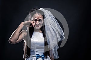 Bride with tearful face, unhappy marriage