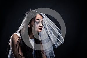 Bride with tearful face, unhappy marriage