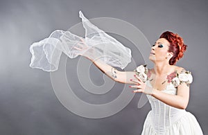 Bride throwing her veil