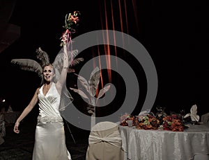 Bride about to toss the bouquet