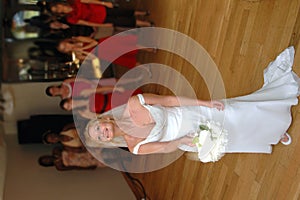 Bride tossing bouquet