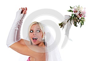 Bride tossing the bouquet