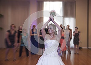 Bride tossing bouquet