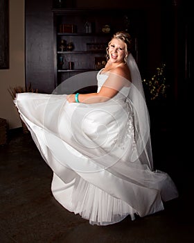 Bride Twirling In Her Wedding Dress